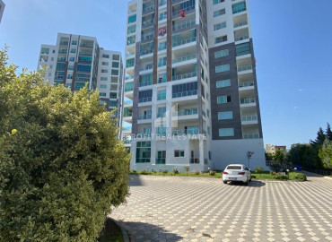 Трехкомнатная квартира, 115м², с видом на море и горы в уютном комплексе в районе Томюк, Мерсин ID-10859 фото-1