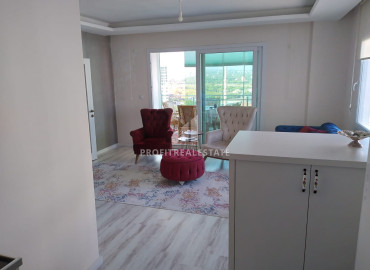 Трехкомнатная квартира, 115м², с видом на море и горы в уютном комплексе в районе Томюк, Мерсин ID-10859 фото-5