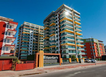 Элегантная квартира 1+1, 60м², в элитном комплексе на первой береговой линии в Махмутларе, Алания ID-10877 фото-1