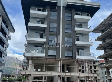 Двухкомнатные апартаменты, 53м², на этапе строительства, в 150м от моря в районе Каргыджак ID-10895 фото-1