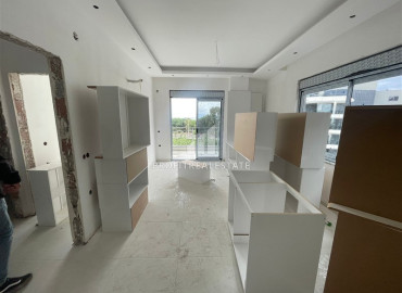 Двухкомнатные апартаменты, 53м², на этапе строительства, в 150м от моря в районе Каргыджак ID-10895 фото-8