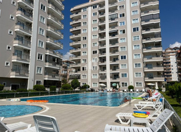 Large furnished duplex 3 + 1 on the first coastline with panoramic sea views, 100 meters from the center of Mahmutlar, Alanya ID-10908 фото-1