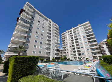 Large furnished duplex 3 + 1 on the first coastline with panoramic sea views, 100 meters from the center of Mahmutlar, Alanya ID-10908 фото-2