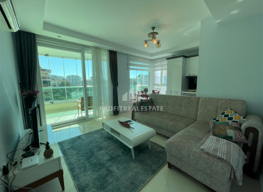 Stylish one-bedroom furnished apartment, 150 meters from the sea, with a glazed balcony, ready to move in, in Oba, Alanya ID-10918 фото-10