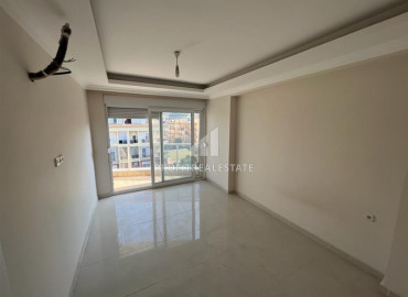 Spacious one-bedroom apartment 80 m2 unfurnished in the green area of Tosmur, Alanya ID-10738 фото-2