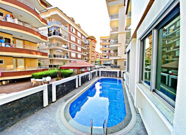 Designer two bedroom apartment 115 m2 with stylish furniture, 300 meters from the sea in Oba, Alanya ID-10948 фото-14