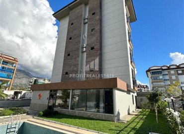 Finished apartment in a new residential residence 300 meters from the beach, with a fine finish, bathroom equipment, kitchen, unfurnished in Kestel, Alanya, 45-115 m2 ID-10949 фото-2
