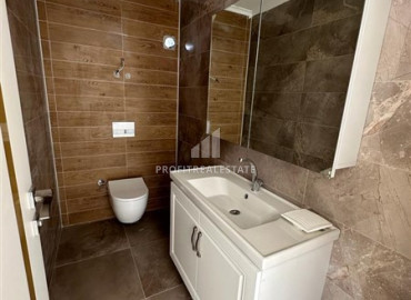 Finished apartment in a new residential residence 300 meters from the beach, with a fine finish, bathroom equipment, kitchen, unfurnished in Kestel, Alanya, 45-115 m2 ID-10949 фото-17