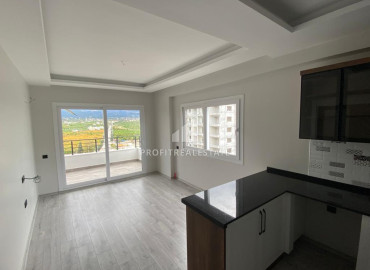 Новая трехкомнатная квартира, 115м², в районе Томюк, Эрдемли, в 400м от Средиземного моря ID-10972 фото-5