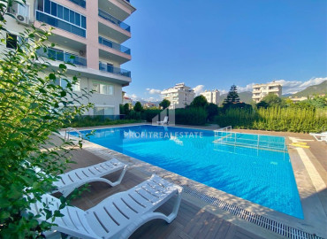 Cozy furnished apartment 1 + 1, 50 meters from the sea, in a residence with facilities, in Kestel, Alanya ID-10980 фото-1