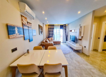 Меблированная двухкомнатная квартира у самого моря, в комплексе класса люкс, в 50 метрах от центра района Махмутлар, Аланья ID-11060 фото-2