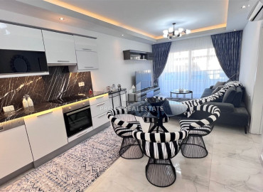 Stylish one-bedroom apartment, ready to move in, 150 meters from the center of Mahmutlar, Alanya ID-11084 фото-1