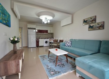One bedroom apartment on the main street in Mahmutlar district of Alanya city, Turkey ID-0859 фото-1