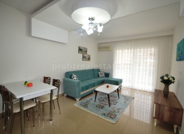 One bedroom apartment on the main street in Mahmutlar district of Alanya city, Turkey ID-0859 фото-2