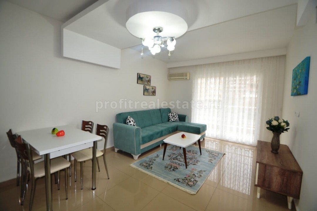 One bedroom apartment on the main street in Mahmutlar district of Alanya city, Turkey ID-0859 фото-2