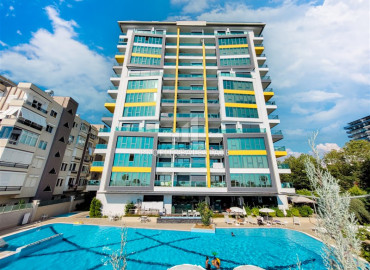 Luxury apartment 1 + 1, 65m², in an elite residence on the first coastline in Mahmutlar. ID-11102 фото-1