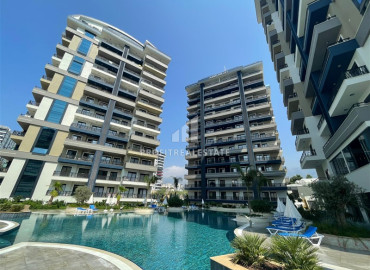 Ready-to-move-in one bedroom apartment in a luxury residential residence, Mahmutlar, Alanya, 56 m2 ID-11108 фото-1