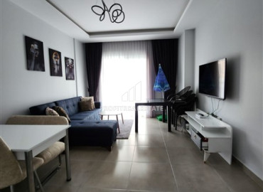 New apartment 1 + 1, 55m², in a residence with good facilities, near the sea in Mahmutlar ID-11110 фото-1