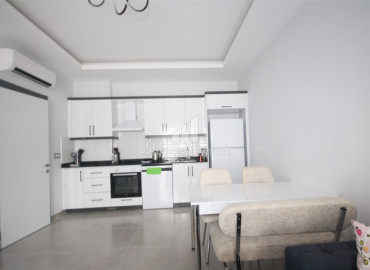 New apartment 1 + 1, 55m², in a residence with good facilities, near the sea in Mahmutlar ID-11110 фото-2