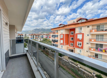 Stylish furnished duplex apartment 3 + 2, with a cozy terrace, 250 meters from the center of Oba, Alanya ID-11137 фото-11