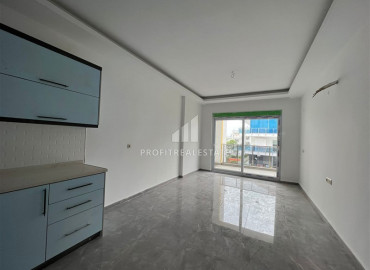 Новые двухкомнатные апартаменты, без мебели, в благоустроенном жилом комплексе Авсаллара, Аланья, 58 м2 ID-11199 фото-1