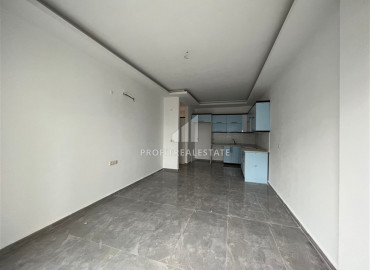 Новые двухкомнатные апартаменты, без мебели, в благоустроенном жилом комплексе Авсаллара, Аланья, 58 м2 ID-11199 фото-2