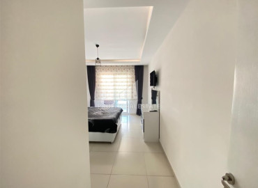 Меблированная квартира с одной спальней, 70м², в элитном комплексе Махмутлара, Алания ID-11229 фото-4