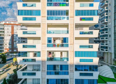 Стильная яркая двухкомнатная квартира 51 м2, с застекленным балконом, в 500 метрах от моря в Махмутларе, Аланья ID-11243 фото-2