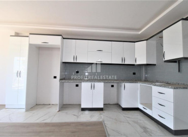 Апартаменты 1+1, 45м², с чистовой отделкой в новой резиденции в центре Мезитли, Мерсин ID-11284 фото-2