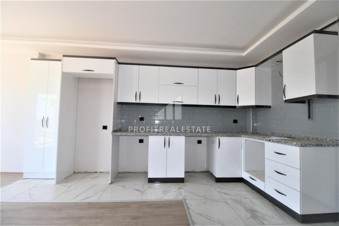 Апартаменты 1+1, 45м², с чистовой отделкой в новой резиденции в центре Мезитли, Мерсин ID-11284 фото-2