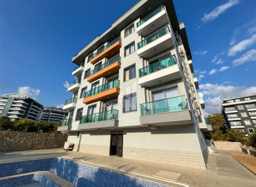 One-bedroom apartment 40 m2, with a fine finish, bathroom equipment, unfurnished, in a residence with facilities in Oba, Alanya ID-11370 фото-1