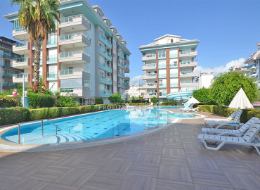 Элегантная трехкомнатная квартира 80 м2 с панорамным видом на море, в 50 метрах от пляжа, Кестель, Аланья ID-11382 фото-1