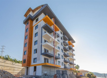 Новая квартира 2+1, 90м2, с чистовой отделкой, без мебели, с видом на море, в Демирташе, Аланья ID-11390 фото-1