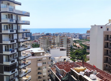 Furnished apartment 2 + 1, with sea views, in a residence with facilities in Mahmutlar, Alanya ID-11416 фото-1