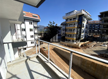 Two bedroom apartment, 110m², in a residence with good facilities under construction in Oba, Alanya ID-11425 фото-4