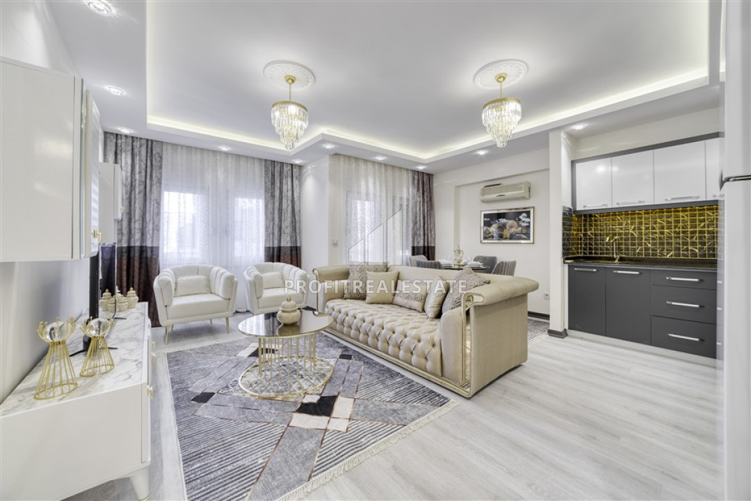 Designer one bedroom apartment, 60m², 200m from the sea, in Mahmutlar, Alanya ID-11427 фото-1