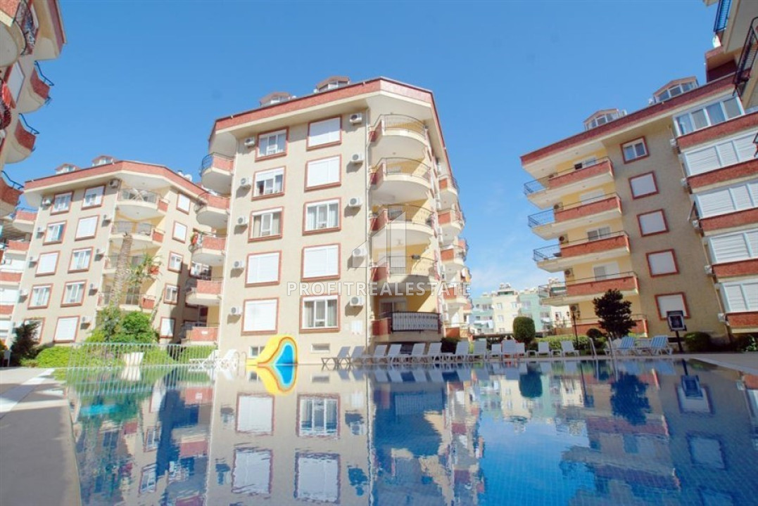 Beautiful apartment 2+1, 100m², with access to the garden in a residence with facilities, 250m from the sea in Oba, Alanya. ID-11473 фото-1
