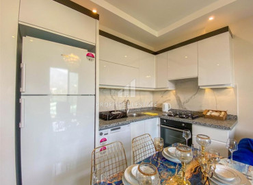 Stylish bright one-bedroom apartment 50 m2, ready to move in, with mountain views, in Mahmutlar, Alanya ID-11472 фото-6