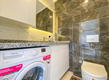 Stylish bright one-bedroom apartment 50 m2, ready to move in, with mountain views, in Mahmutlar, Alanya ID-11472 фото-10