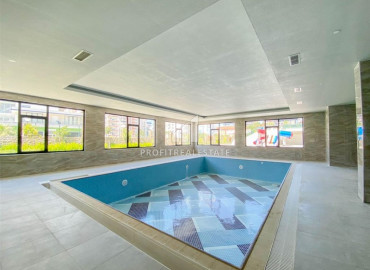 Stylish bright one-bedroom apartment 50 m2, ready to move in, with mountain views, in Mahmutlar, Alanya ID-11472 фото-14