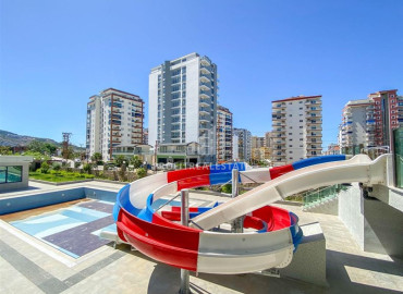 Stylish bright one-bedroom apartment 50 m2, ready to move in, with mountain views, in Mahmutlar, Alanya ID-11472 фото-16