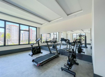 Stylish bright one-bedroom apartment 50 m2, ready to move in, with mountain views, in Mahmutlar, Alanya ID-11472 фото-19