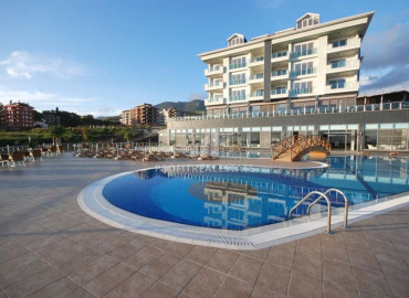 Bright furnished apartment 75 m2, with one bedroom and sea views in a residence with facilities in Oba, Alanya ID-11471 фото-1
