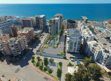 Luxury apartment 2 + 1 with author&#39;s interior, overlooking the sea, 50 meters from the beach in Oba, Alanya ID-11469 фото-2
