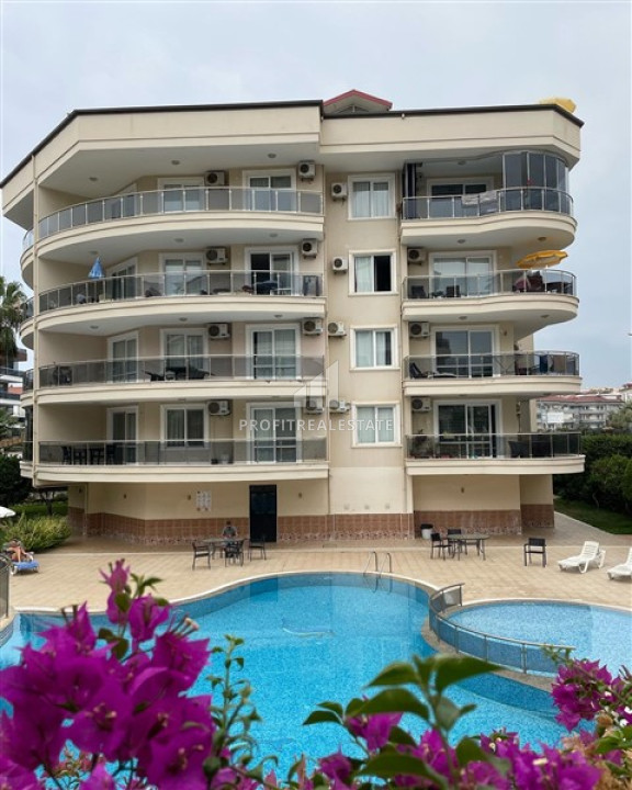 Cozy two bedroom apartment, 110m², close to the sea in Oba, Alanya, in a comfortable residence ID-11487 фото-1