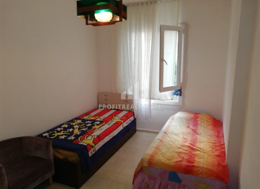 Недорогая меблированная квартира с двумя спальнями, в 350 метрах от моря, в доме с бассейном в Махмутларе, Аланья ID-11489 фото-14