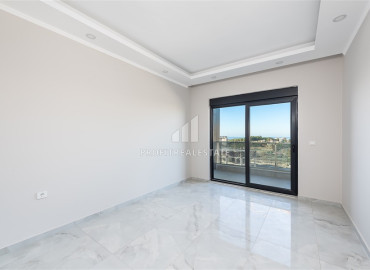 Новая двухкомнатная квартира 52 м2, с видом на море, с чистовой отделкой, без мебели в Каргыджаке, Аланья ID-11492 фото-2
