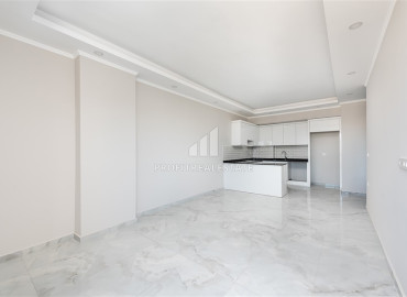 Новая двухкомнатная квартира 52 м2, с видом на море, с чистовой отделкой, без мебели в Каргыджаке, Аланья ID-11492 фото-6