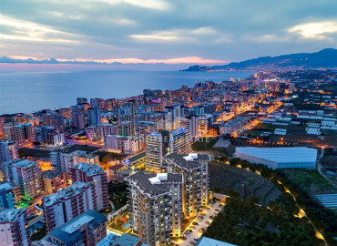 Excellent one-bedroom apartment, 59m², in a residence under construction with hotel facilities 450 meters from the sea in Mahmutlar ID-11544 фото-13