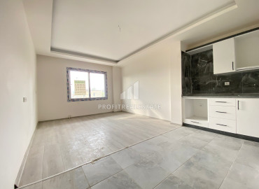 Квартира с тремя спальнями, 135м², с чистовой отделкой, в новой резиденции в Эрдемли, Мерсин ID-11558 фото-1